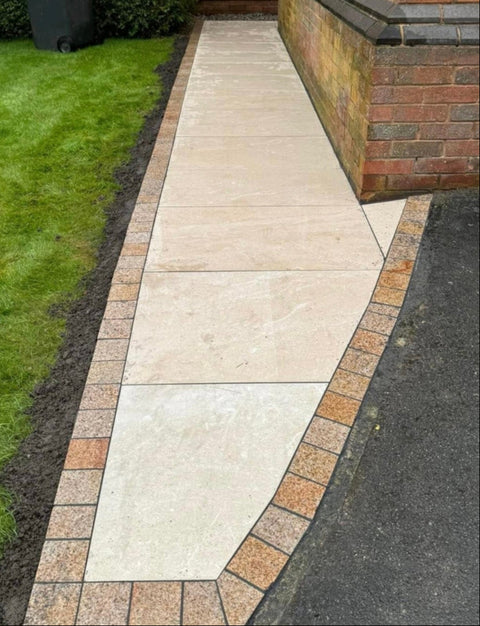Rosa Porcelain Paving Edged with Desert Gold Granite Setts